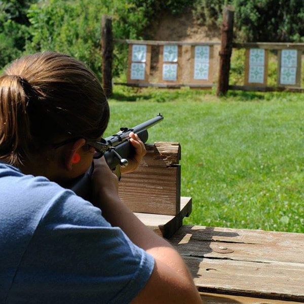 shooting a rifle during firearms training